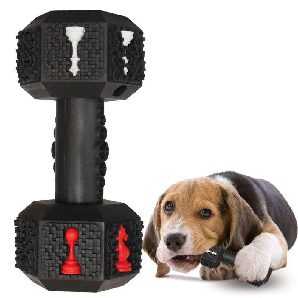 Durable black rubber dumbbell-shaped dog chew toy with textured surface for aggressive chewers.
