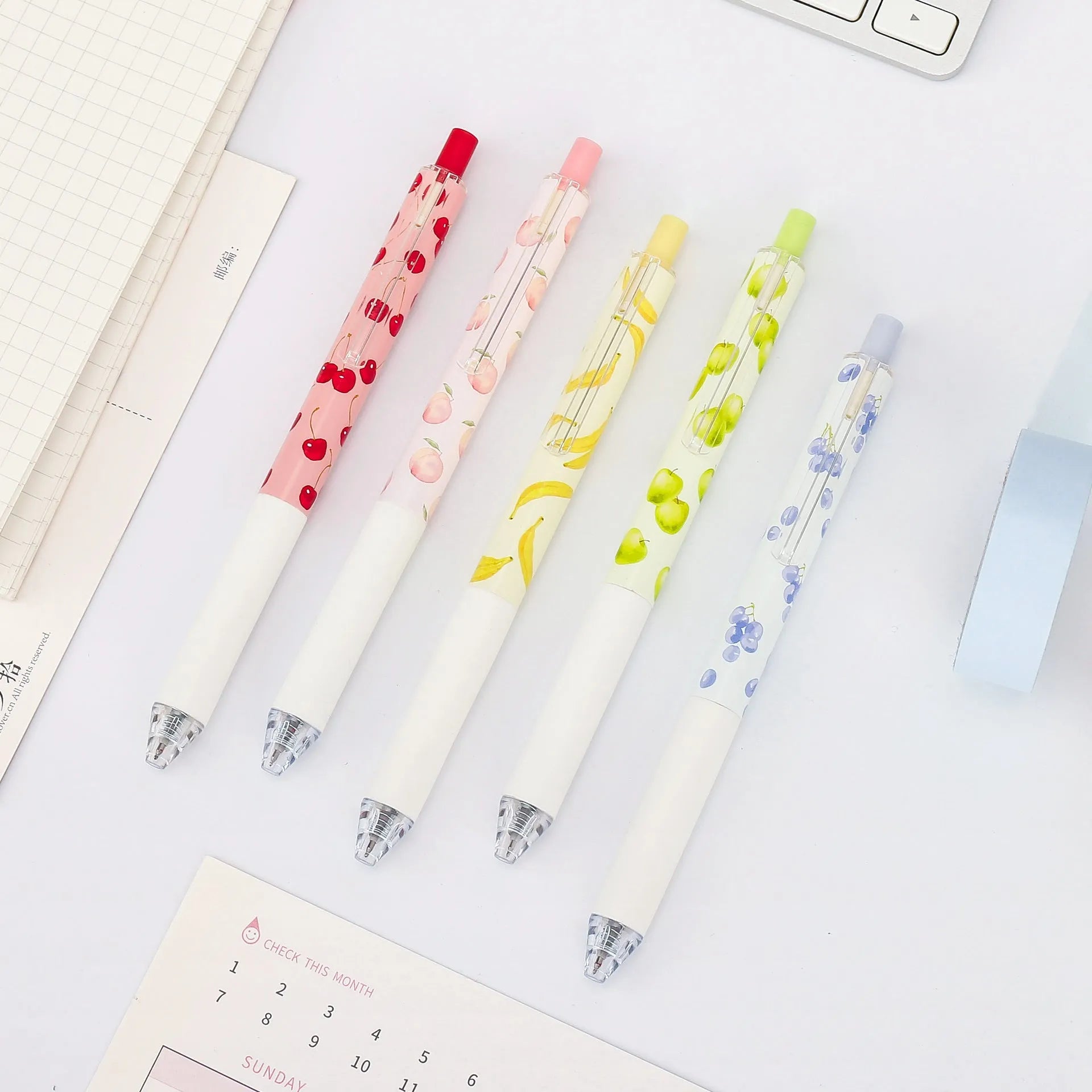 Fruit-scented press-action pen with 0.5mm quick-drying black ink refill