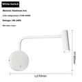 Rocker LED reading wall lamp in black finish with adjustable arm and head for bedside use