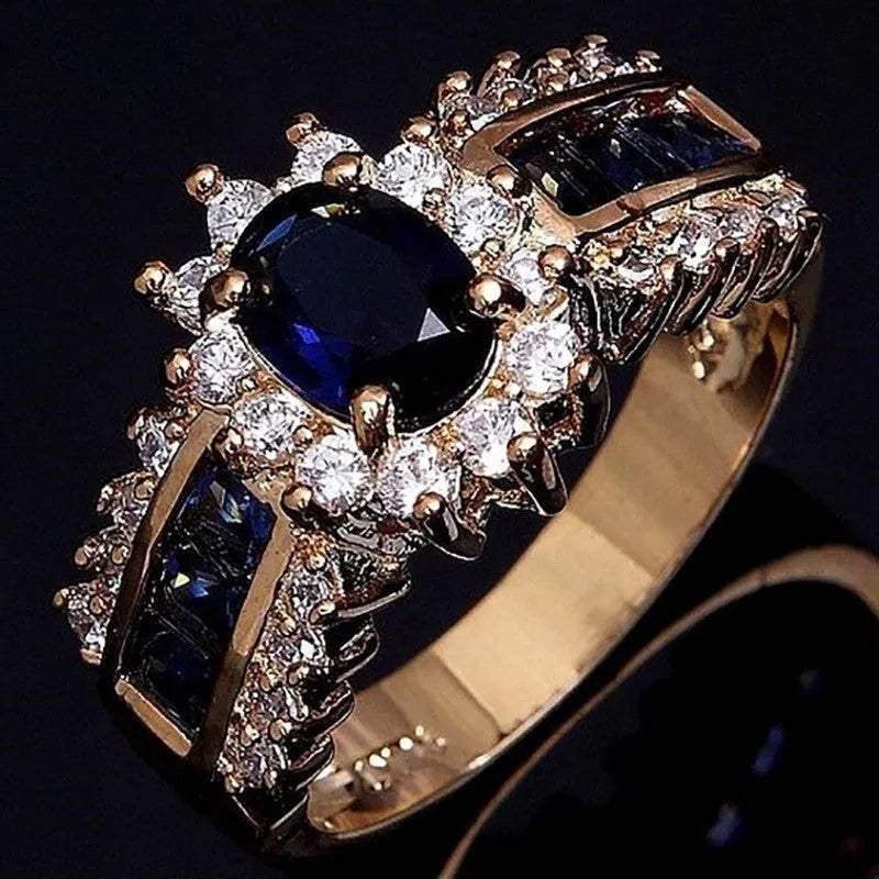 Personalised fashion rings with diamond treatments in blue and purple designs on zinc alloy