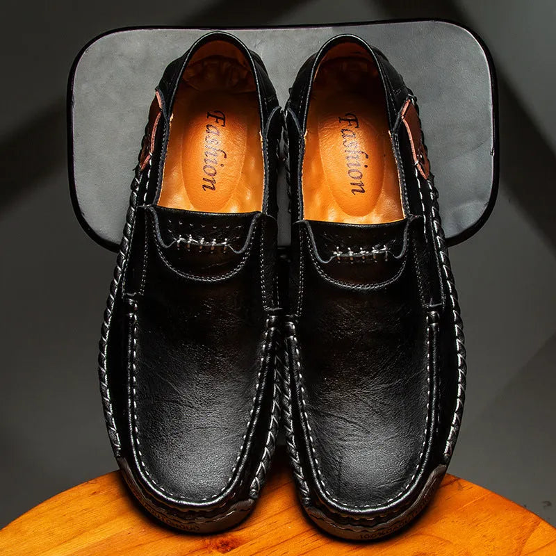Men's casual leather shoes with soft rubber sole, round toe, two-layer cowhide upper, black colour, side stitching detail