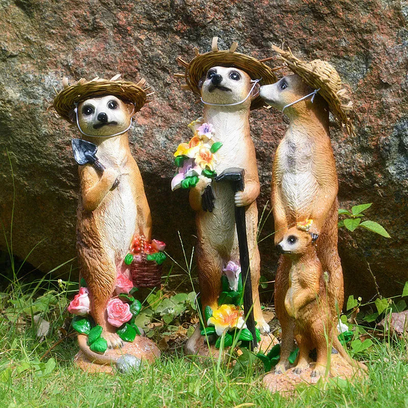 Straw hat mongoose garden ornament with mother and baby figures