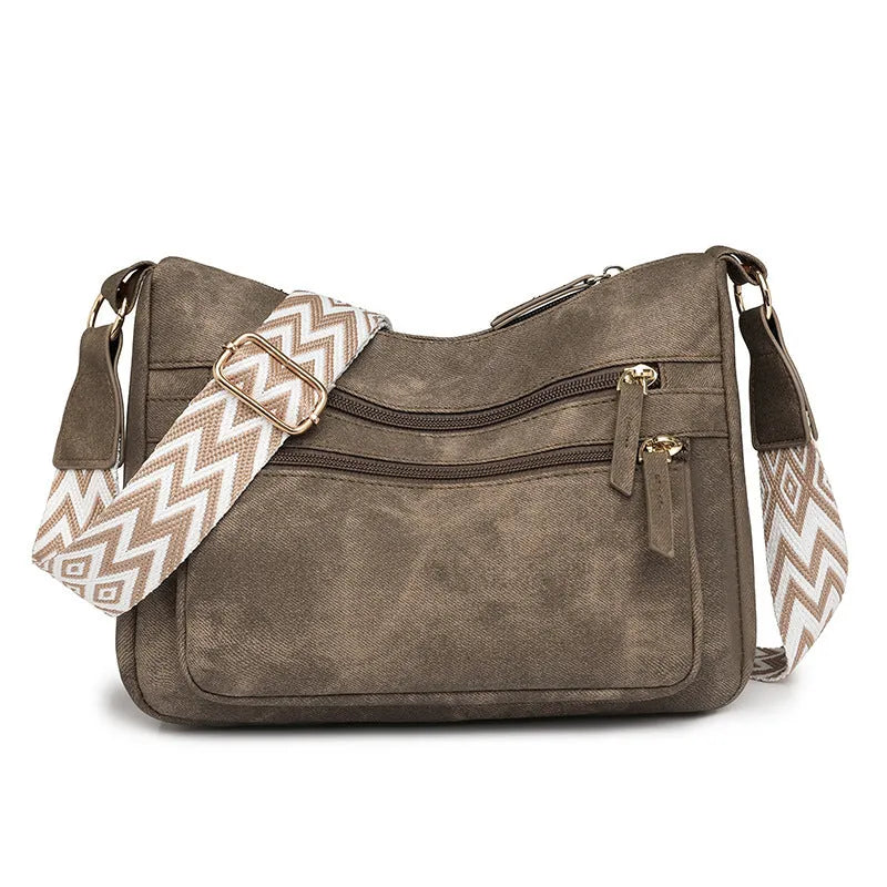 Women's large capacity one shoulder crossbody backpack in soft PU leather with waterproof finish, available in five colours