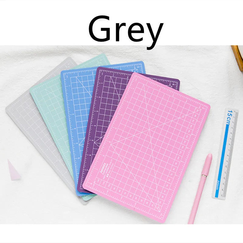 Art pen knife cutting board set with backing board, ruler, sharpener, and blade in blue colour