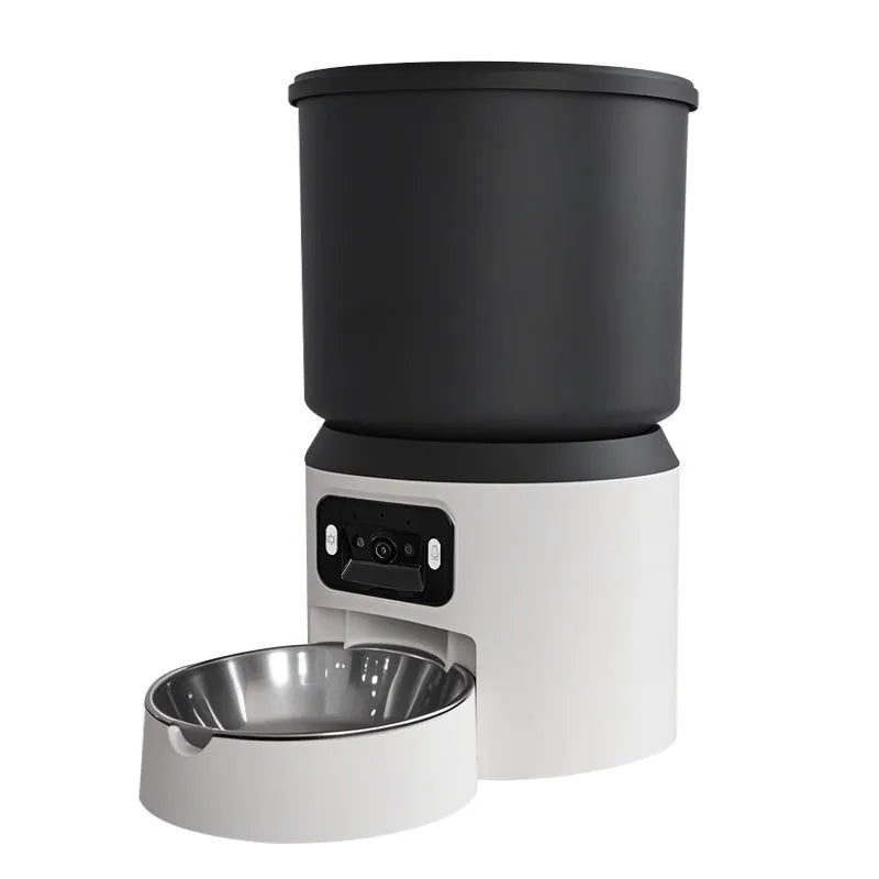 4L smart pet feeder with remote control and video camera on a kitchen floor