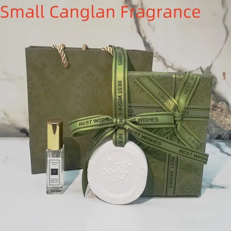 Car aromatherapy pendant set with stone diffuser, 10ml essential oil bottle, gift box, and handbag.