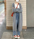 Women's loose fit V-neck knitted cardigan in khaki, showing medium length and long sleeves.