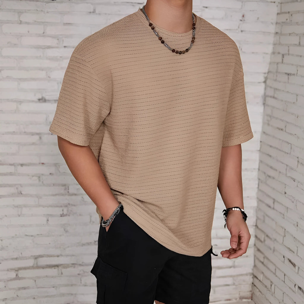 Men's loose hollow slim fit short sleeve T-shirt in lightweight polyester fabric.