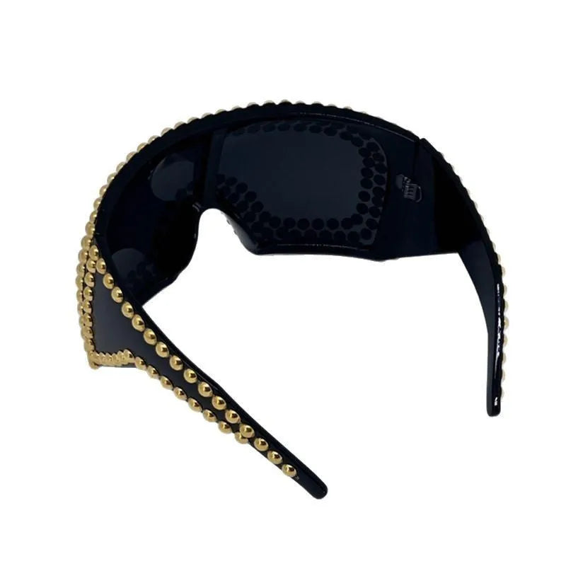 Men's silver punk sunglasses with large square frames and metal rivet details on the temples.