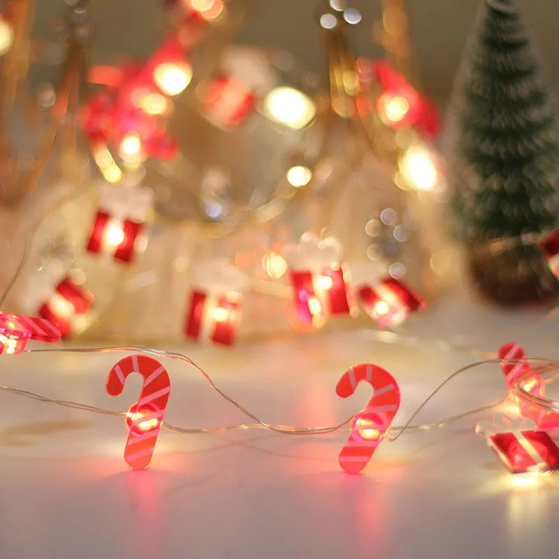30 warm white LED copper wire string lights with 2 metre length and battery box, six festive shapes on display