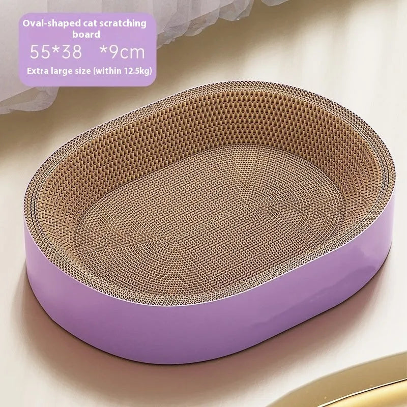 Green oval corrugated paper cat scratch board with integrated nest measuring 55cm in diameter