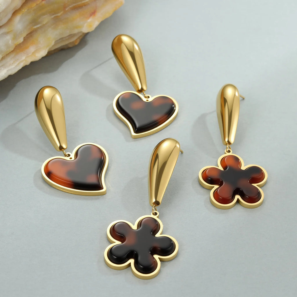 Tortoiseshell resin Hawksbill colour earrings in heart or flower shape made from 18K stainless steel.