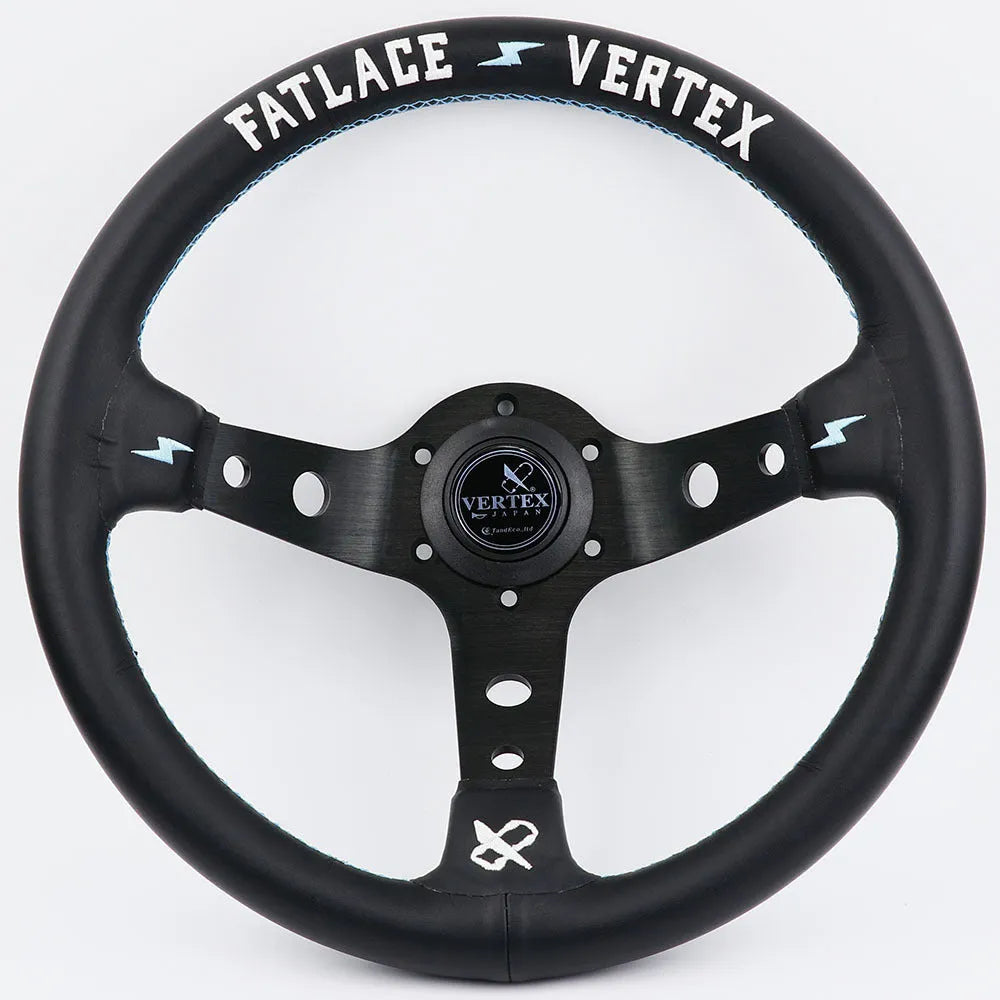Black alloy racing steering wheel with deep concave rim and star embroidery pattern.