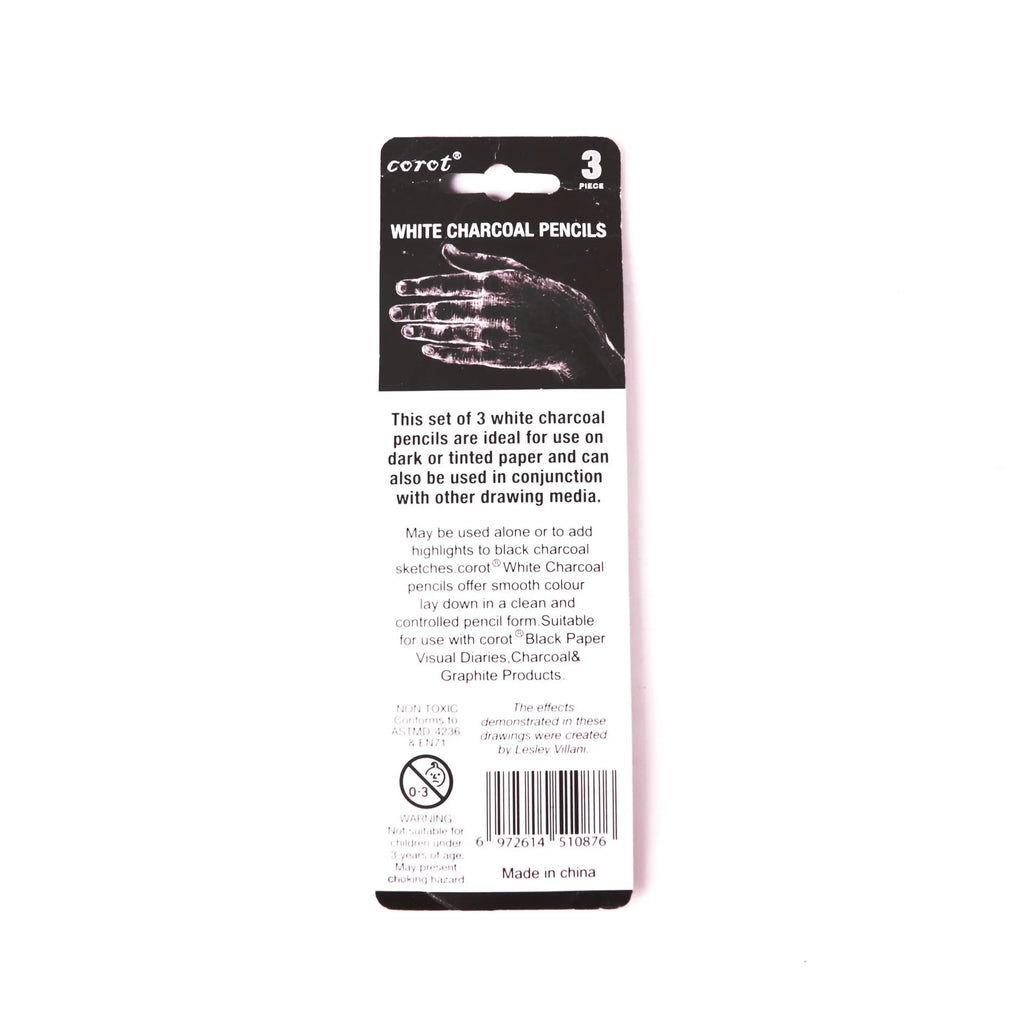 Set of three white charcoal pencils in wooden barrels for sketching on dark paper