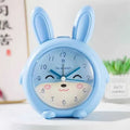 Colourful cartoon children's alarm clock with singing alarm and night light.