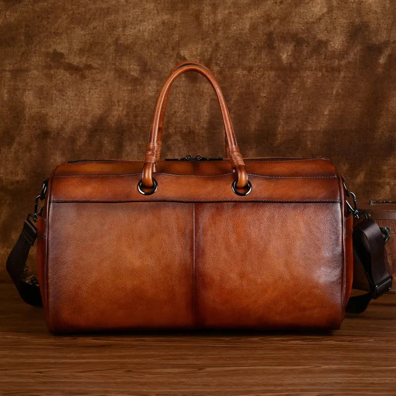 Genuine leather retro handbag in vintage brown colour showing handmade construction details