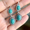 Silver plated geometric ethnic style earrings with chamfered square pattern in turquoise imitation colour