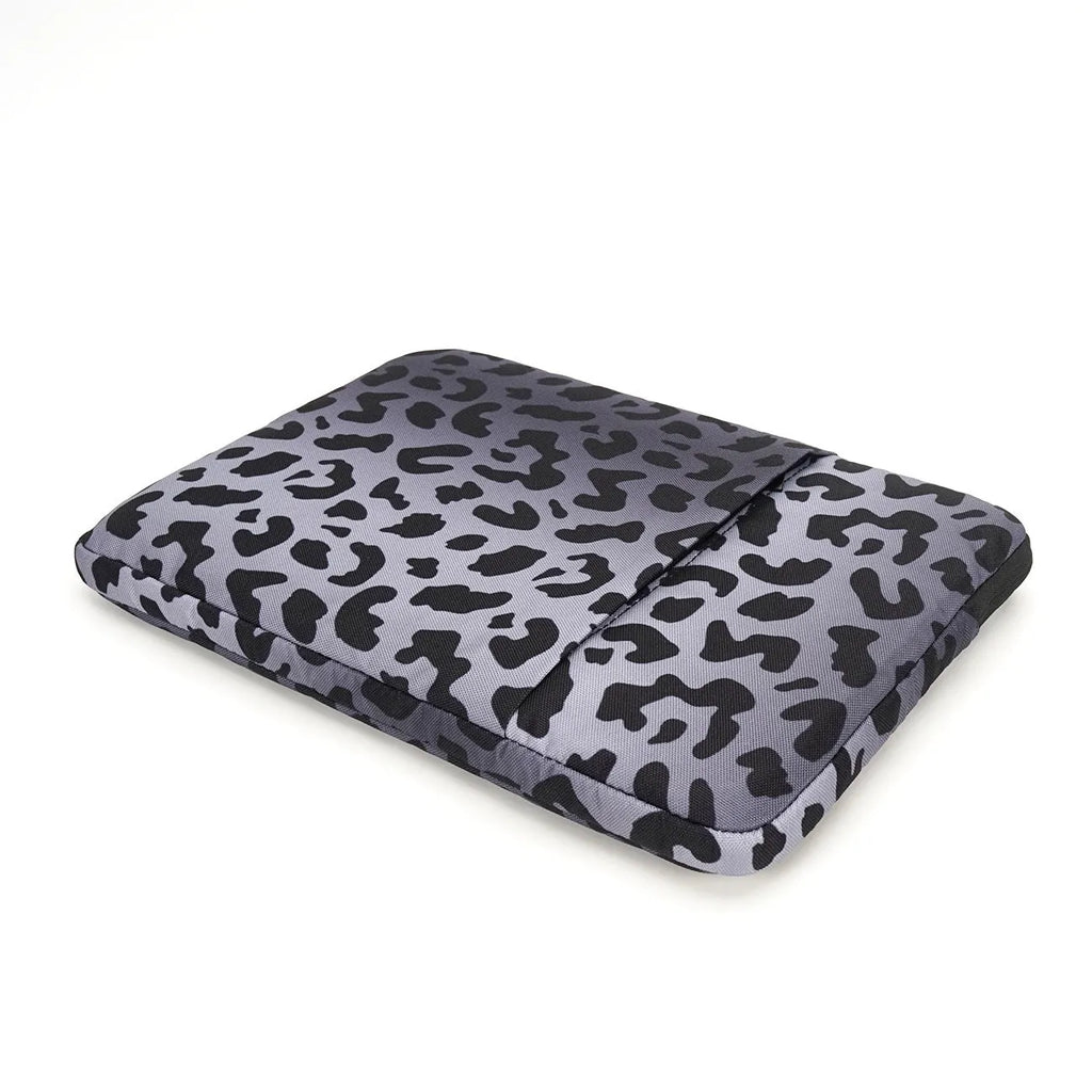 Leopard print laptop sleeve with polyester exterior and flannel lining for 13-inch to 16-inch devices