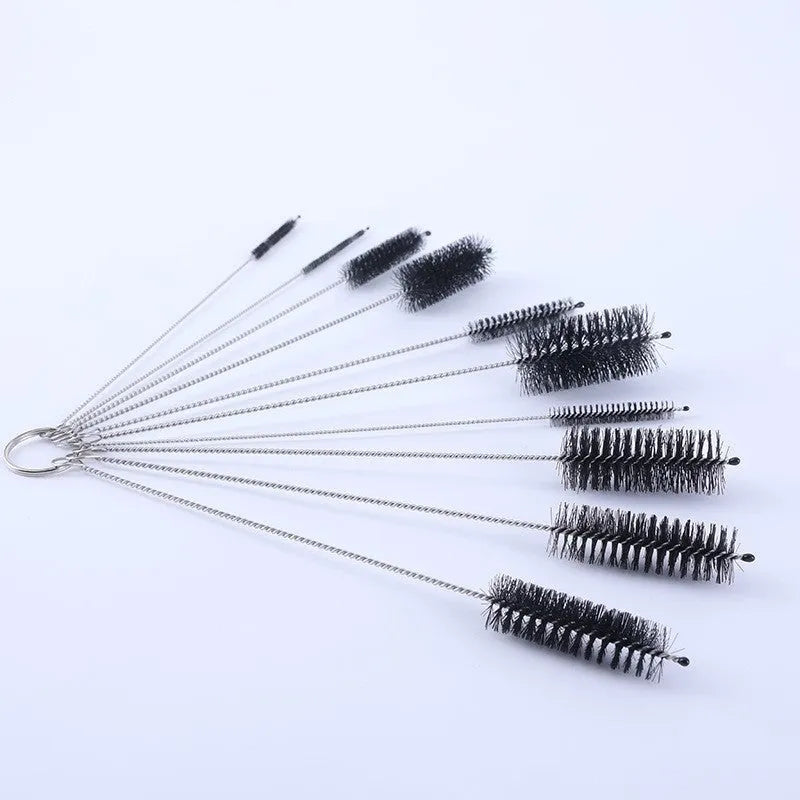 Set of stainless steel handled cleaning brushes with nylon bristles for straws and bottles.