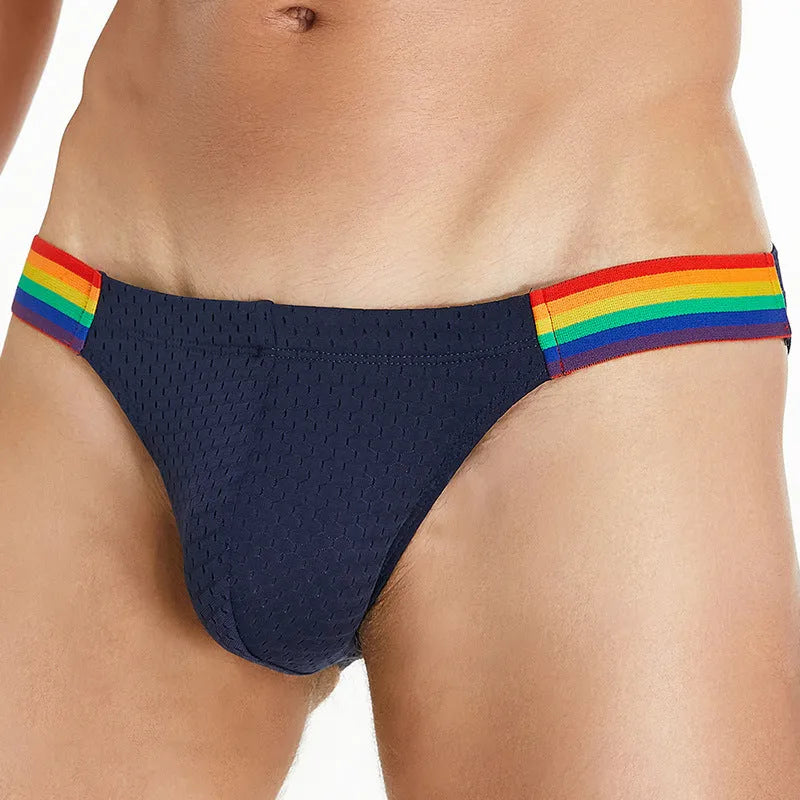 Men's nylon mesh briefs with a low waist and multicoloured rainbow waistband.