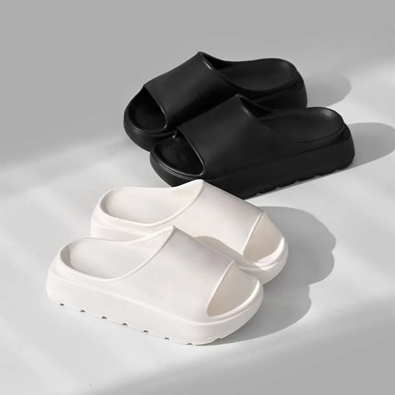 Women's thick-soled beach slippers in beige with a textured EVA sole.
