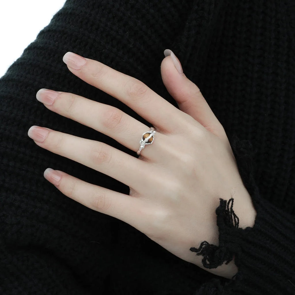 Silver Saturn open ring with tigereye detail and white gold-coloured electroplated finish, adjustable opening