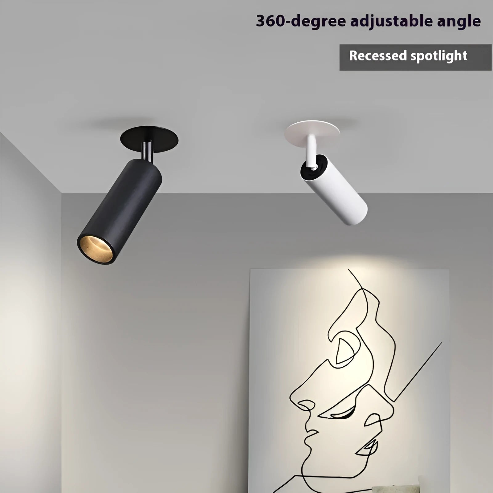 Black recessed cylinder LED spotlight installed in a ceiling track, showing adjustable head.