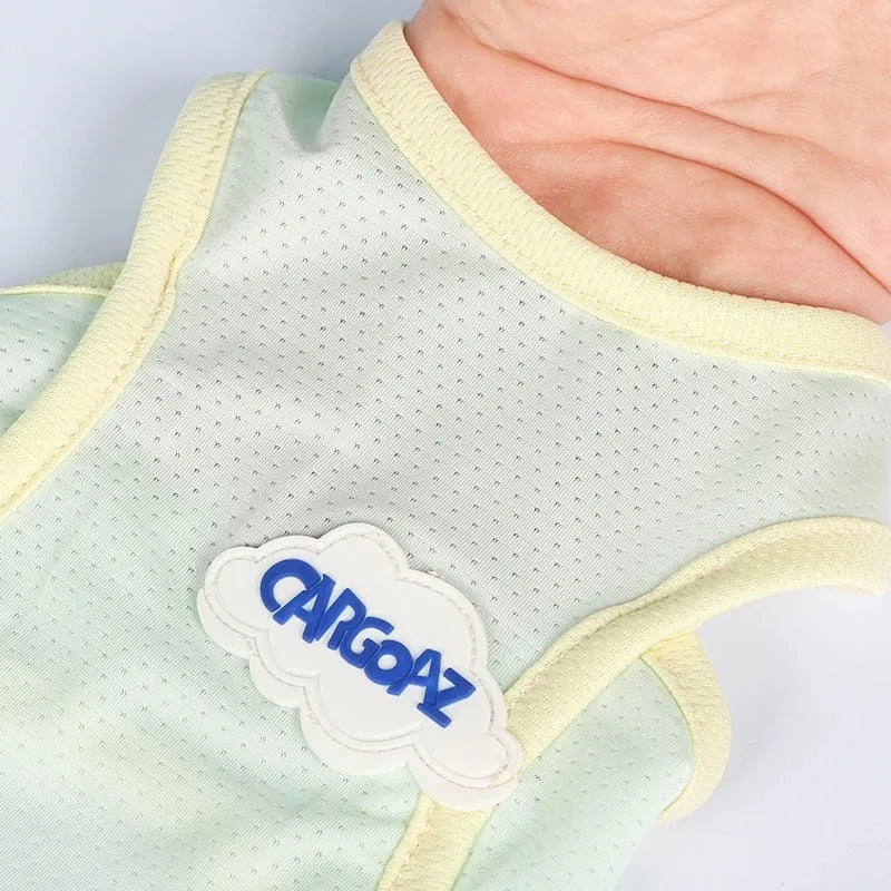 Grass green sleeveless vest for a cat, made from thin polyester fabric, on a white background.
