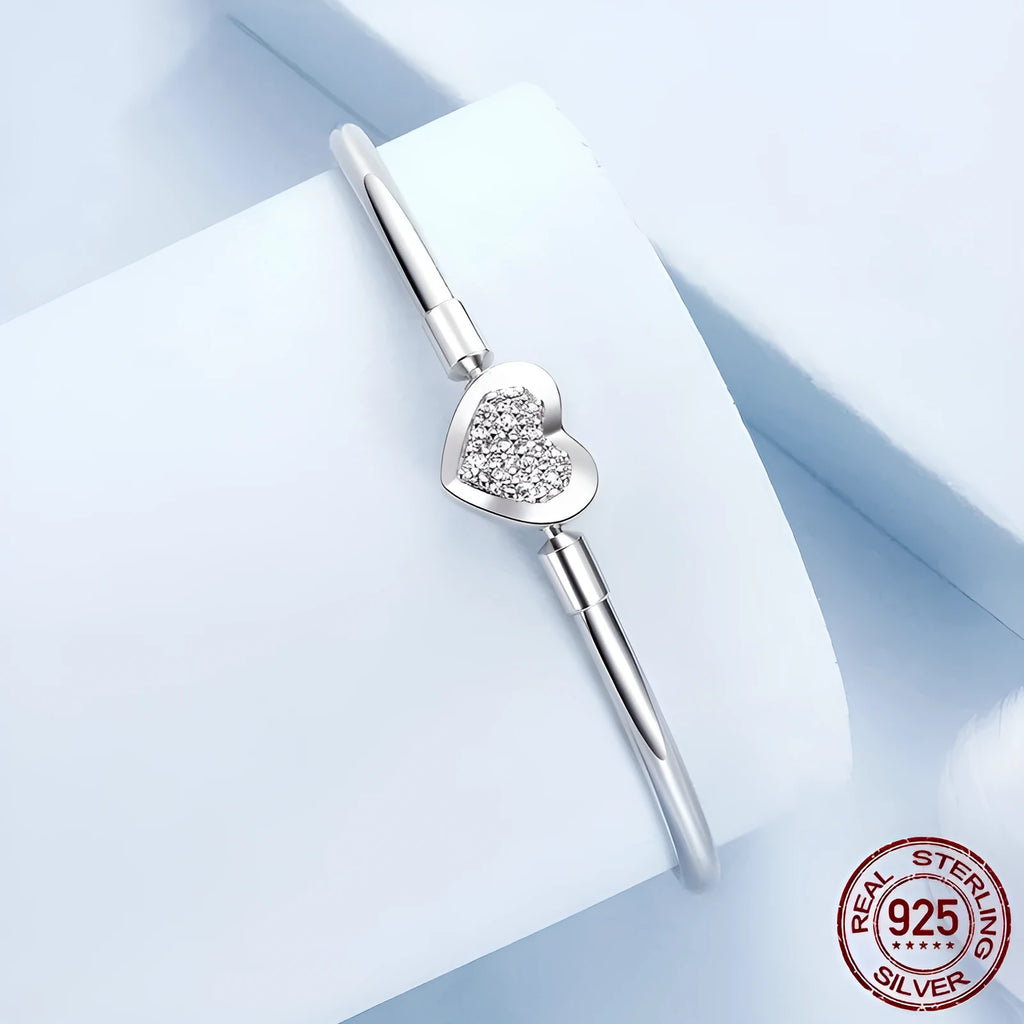 S925 sterling silver heart-shaped cubic zirconia bracelet with buckle clasp on white background
