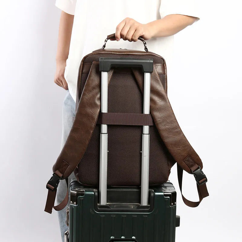 Men's casual business backpack in solid colour, black PU leather, urban simplicity style for travel