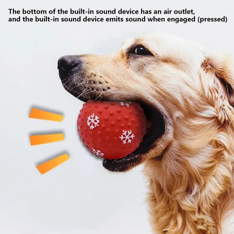Red and green Christmas dog toy ball with snowflake pattern, approximately 7cm diameter