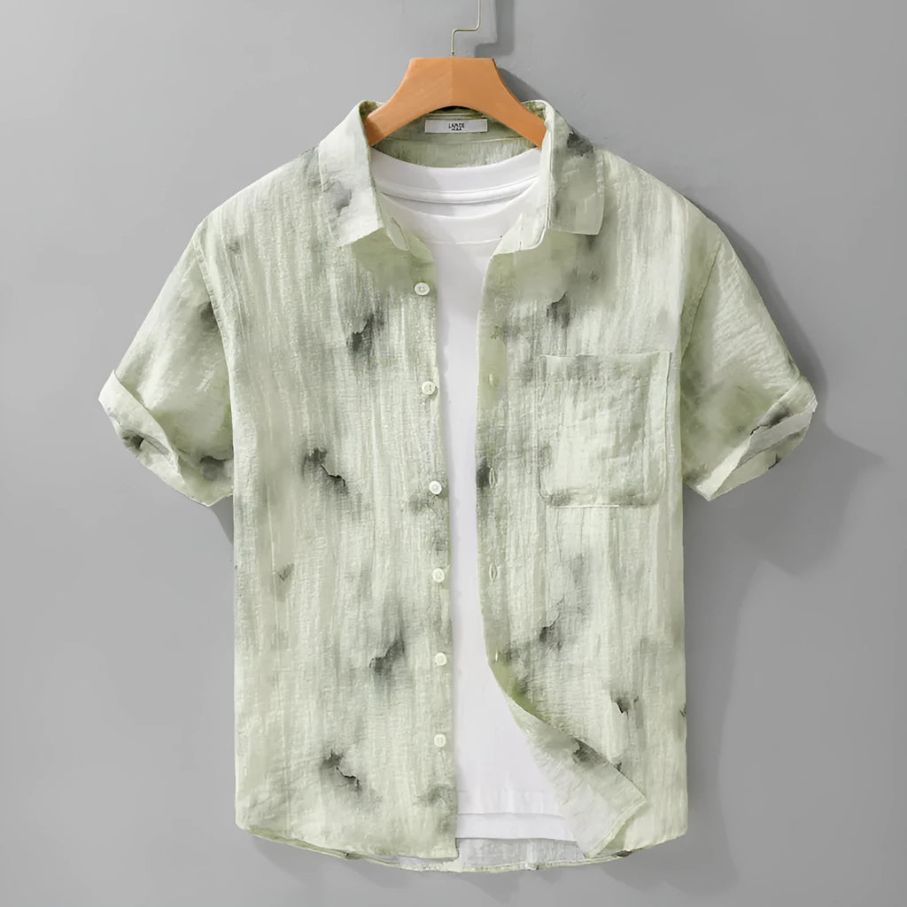 Linen blend printed short sleeve shirt cardigan in light green floral pattern, loose fit, on a female model