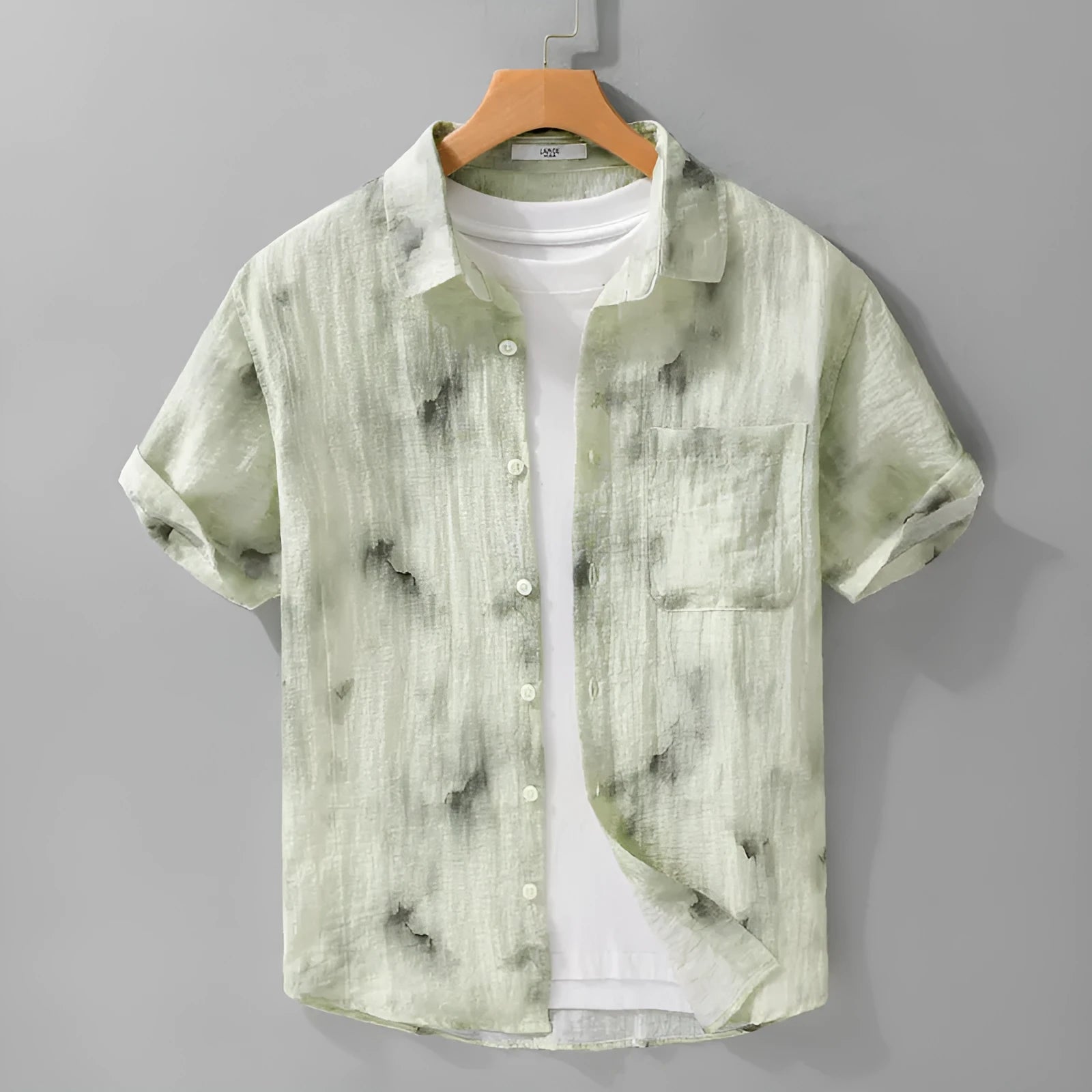 Linen blend printed short sleeve shirt cardigan in light green floral pattern, loose fit, on a female model