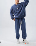 Men's polar fleece winter sports suit with crew neck coat and matching padded fleece trousers