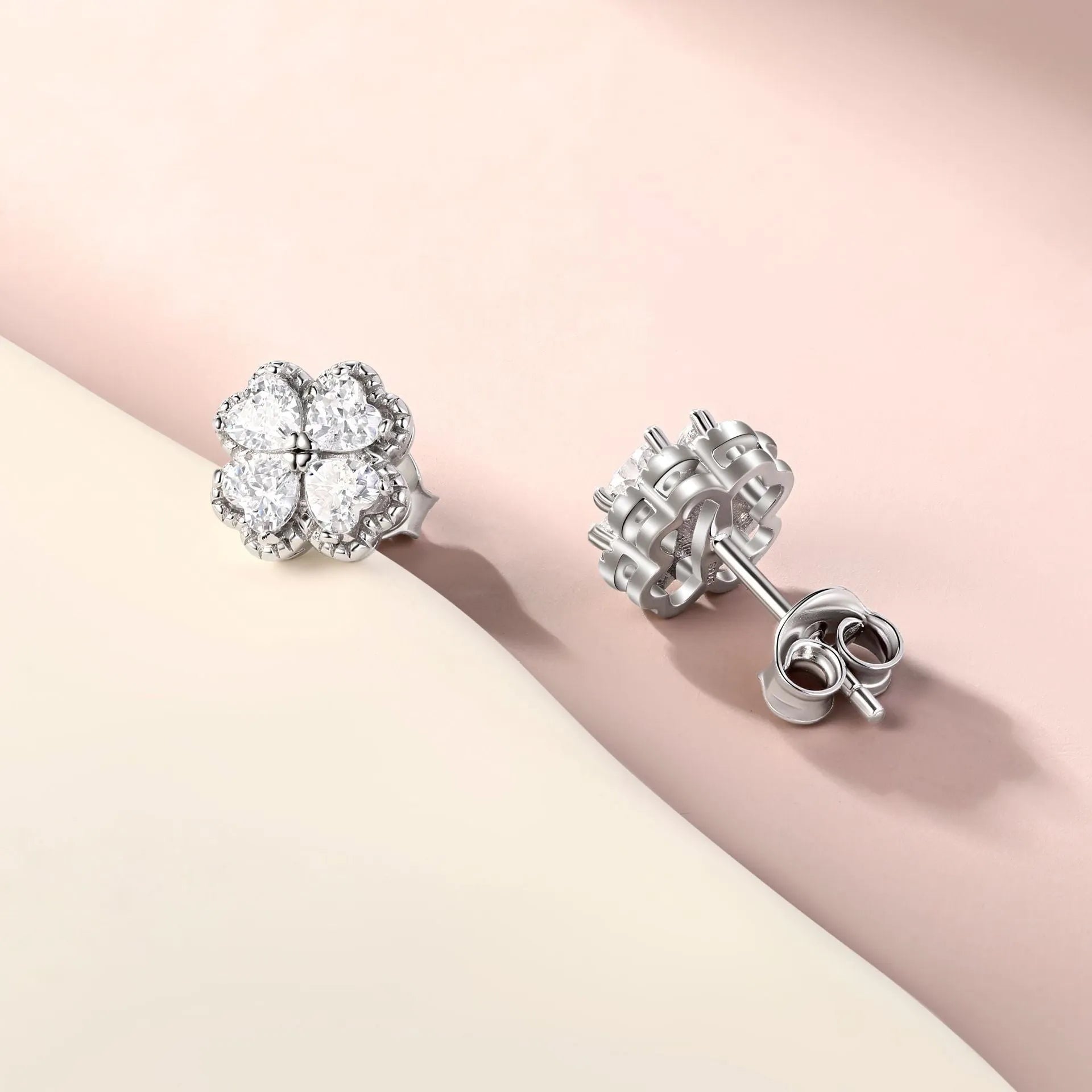 925 sterling silver heart-shaped four-leaf clover earrings with white gold colour and zircon stones.
