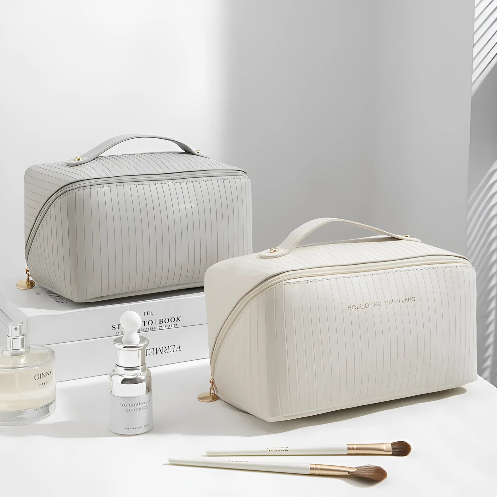 Vertical pattern pillow makeup bag in a cubic shape with large capacity for travel storage.
