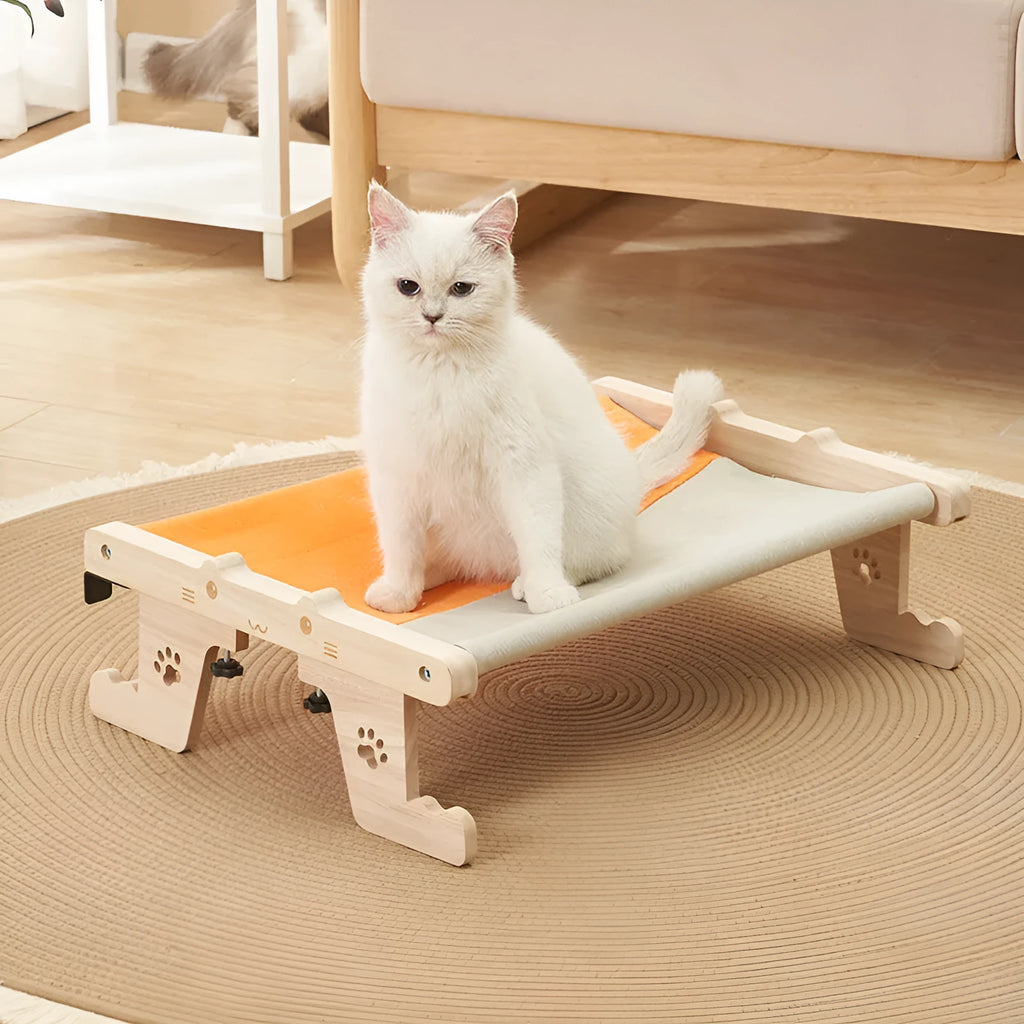 Wooden cat hanging bed mounted on window with suction cups, hammock-style pet sleeping area