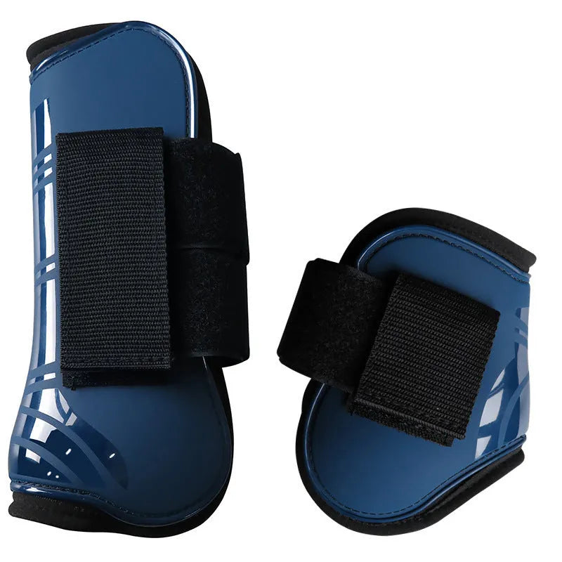 Horse leg guards in PU diving material, close-up on a front leg guard showing red colour and padded construction