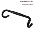 Black aluminium alloy road bike bent handlebar showing its curved shape and clamp area