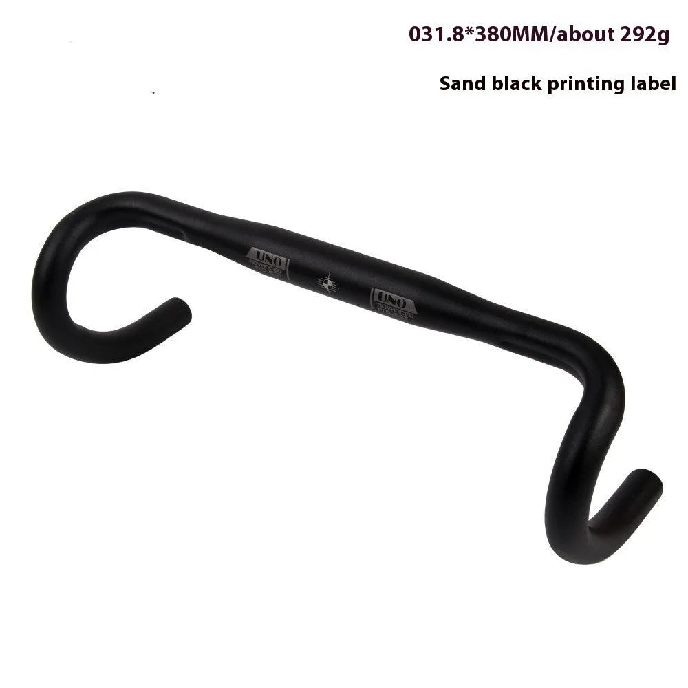 Black aluminium alloy road bike bent handlebar showing its curved shape and clamp area