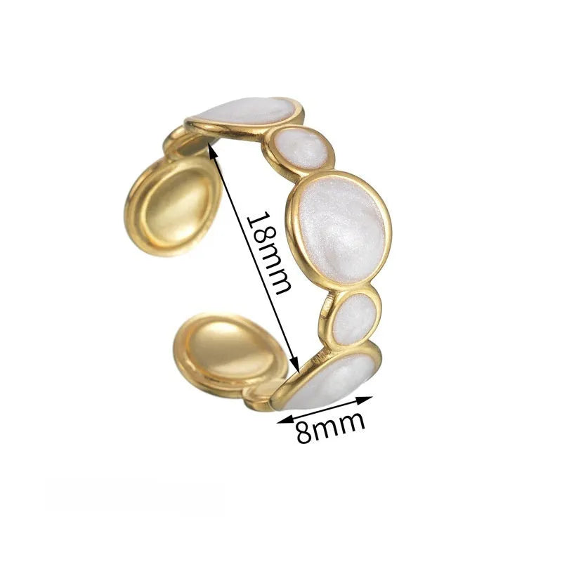 Stainless steel geometric ring with an adjustable opening band for women.