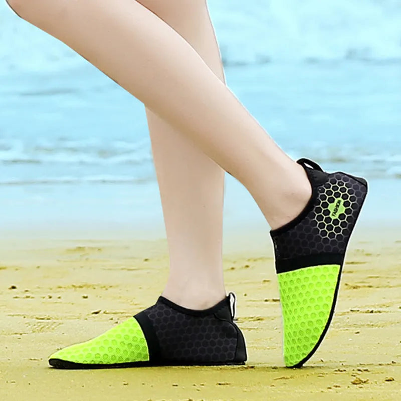 Unisex mesh beach shoes in blue with rubber sole, flat heel, and round toe