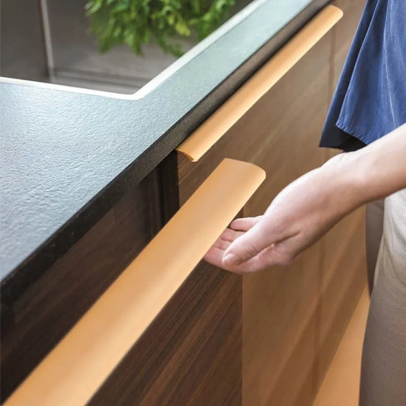 Aluminium alloy no-drill hidden cabinet handle in black finish, 200mm length, flush fit on a cabinet door