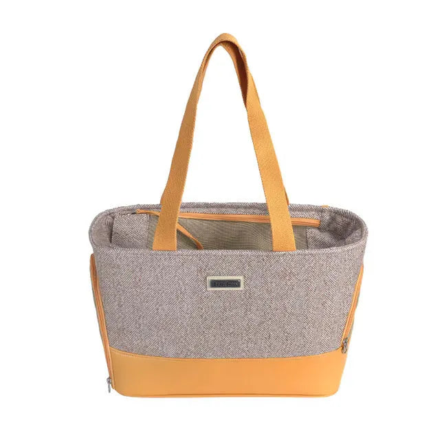 Portable pet backpack in beige brown with breathable space capsule, wool PU construction, side view