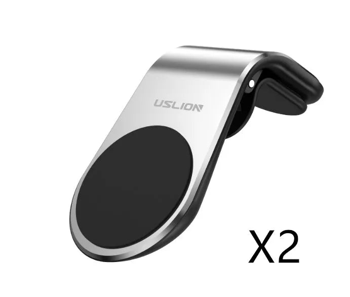 Black universal car phone holder bracket mounted on a car dashboard holding a smartphone.