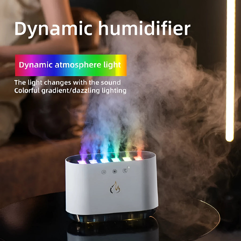 White large-capacity humidifier with colourful LED atmosphere lamp and aromatherapy diffuser on a table.