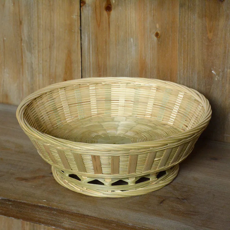 Handmade woven bamboo storage basket showing traditional craftsmanship and three size variations