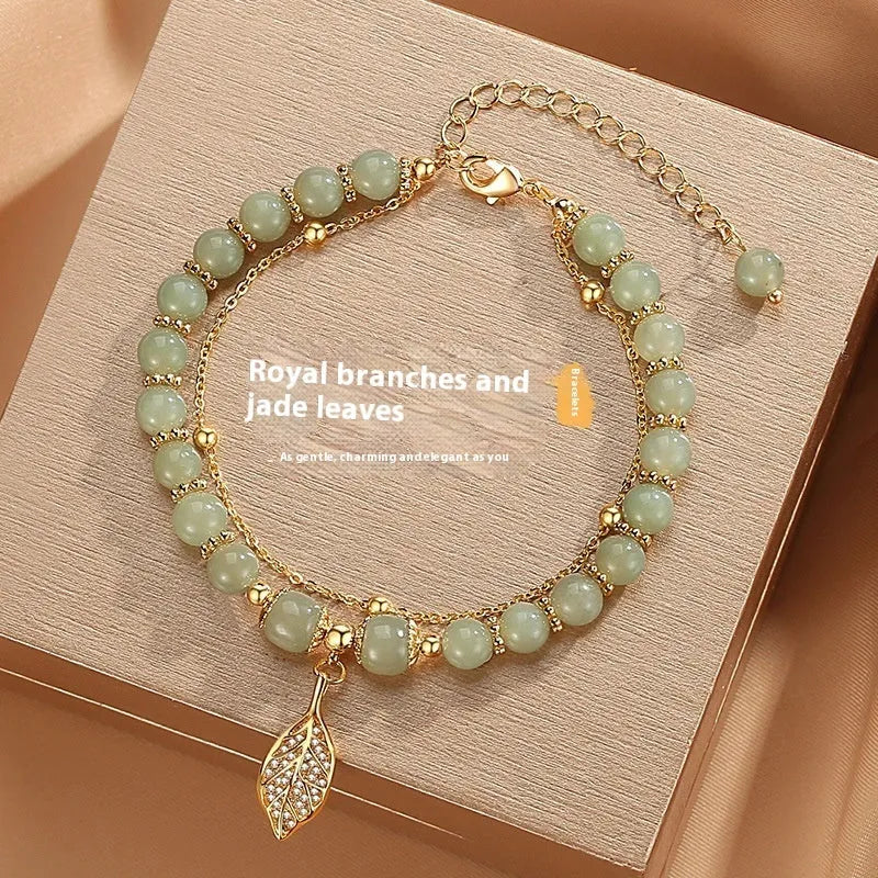 Chinese style bamboo leaf glass bracelet for women with manual craftsmanship.