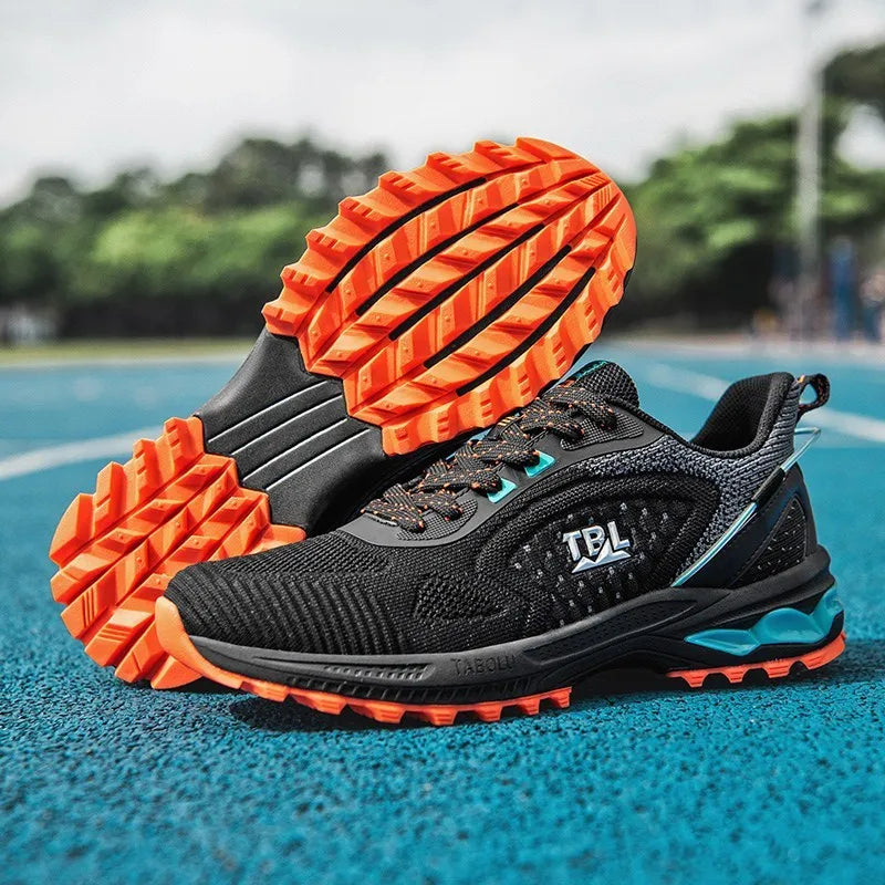 Junior high school running shoes with non-slip rubber sole and mesh upper, side view, in Black Grey colour