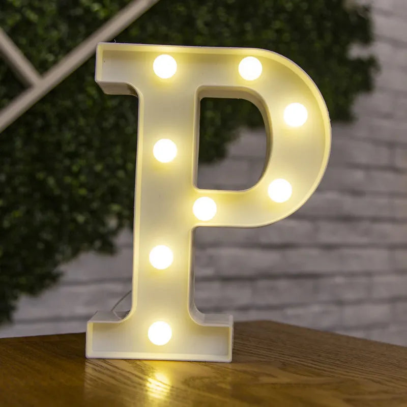 White plastic LED marquee letter sign with warm white glow, 22cm tall